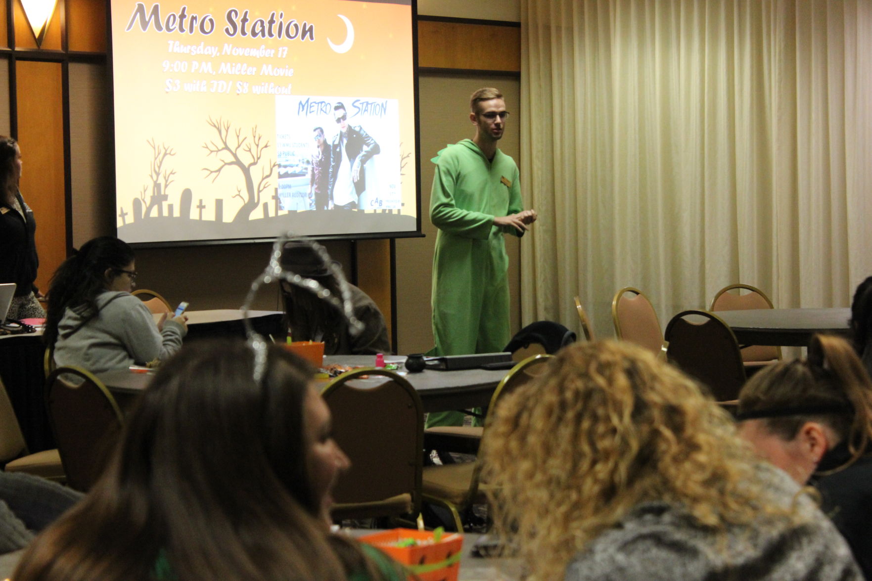 Nick Font, CAB concert coordinator, dressed in dinosaur costume discussing Metro Station's arrival to WMU on Nov. 17th.